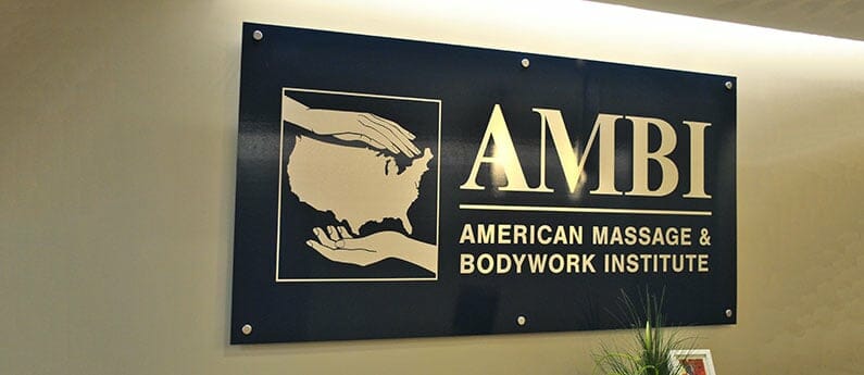 Building Entrance with AMBI plaque. Looking for an elite Massage Education? Come to AMBI.